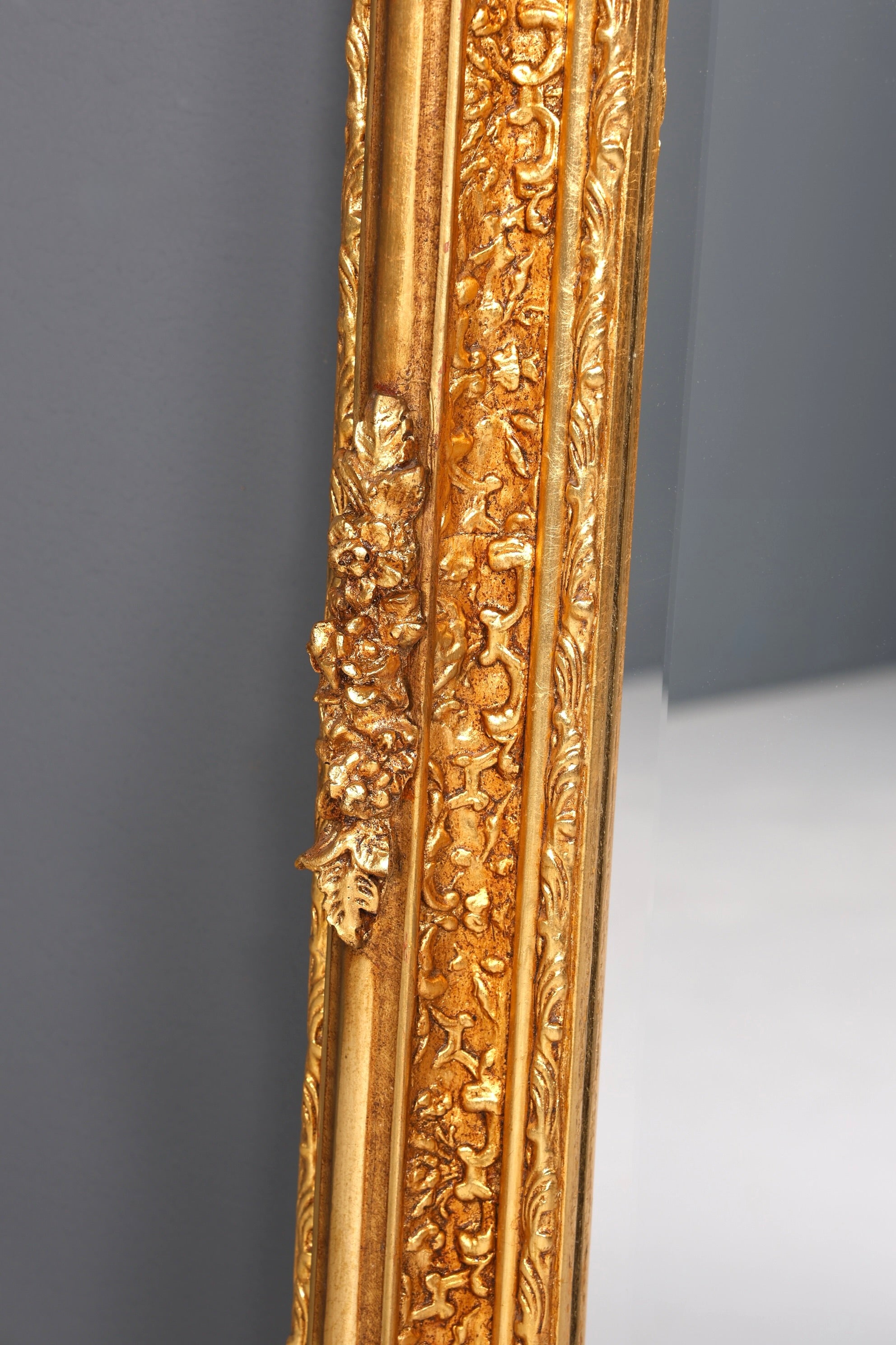 Beautiful, ornate Baroque-style wall mirror with ornaments, hallway mirror, gold mirror