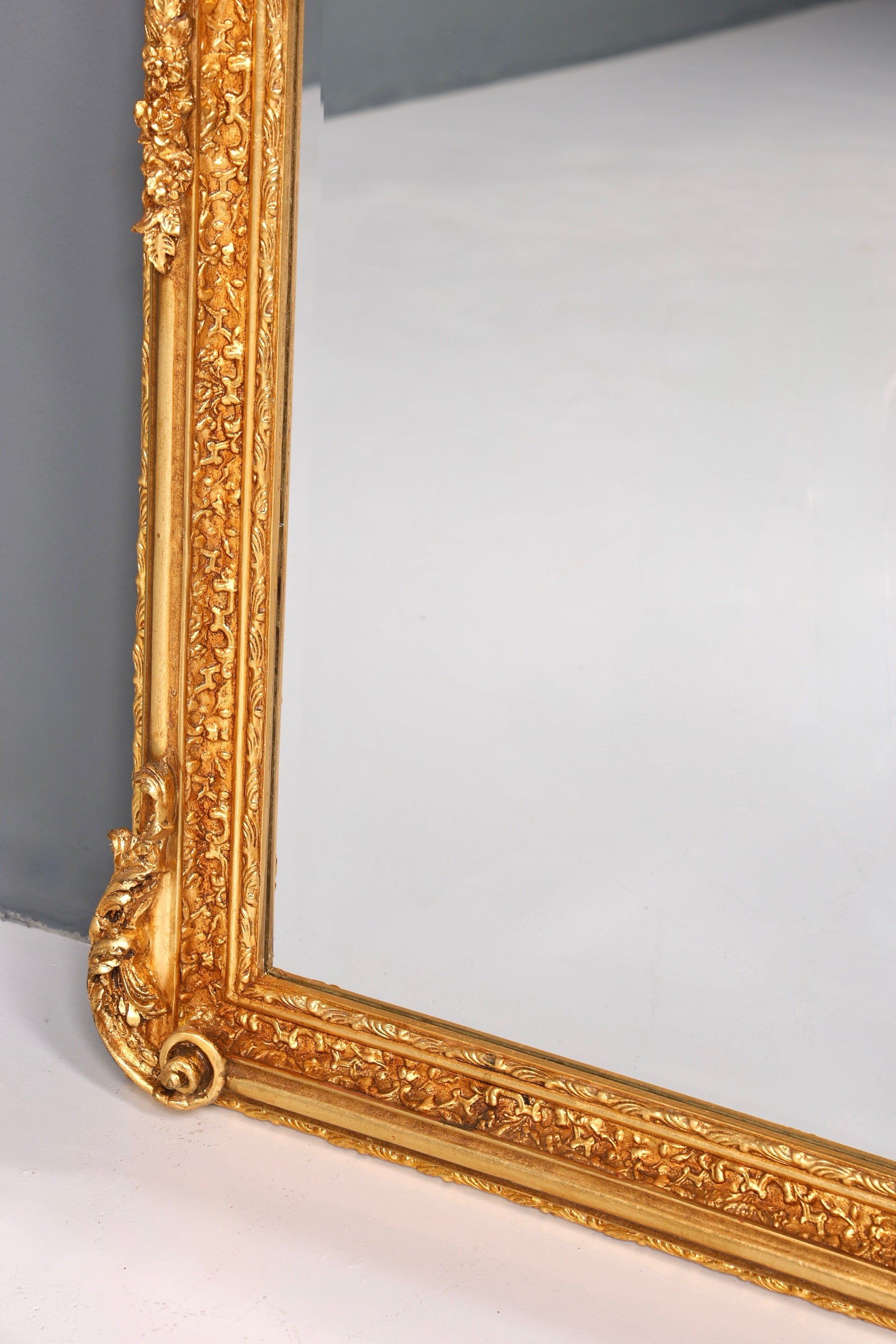 Beautiful, ornate Baroque-style wall mirror with ornaments, hallway mirror, gold mirror