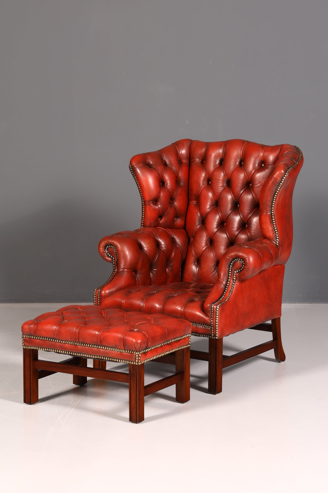 Original Chesterfield wingback armchair with footstool, genuine leather, English gentleman’s chair, leather armchair, antique vintage