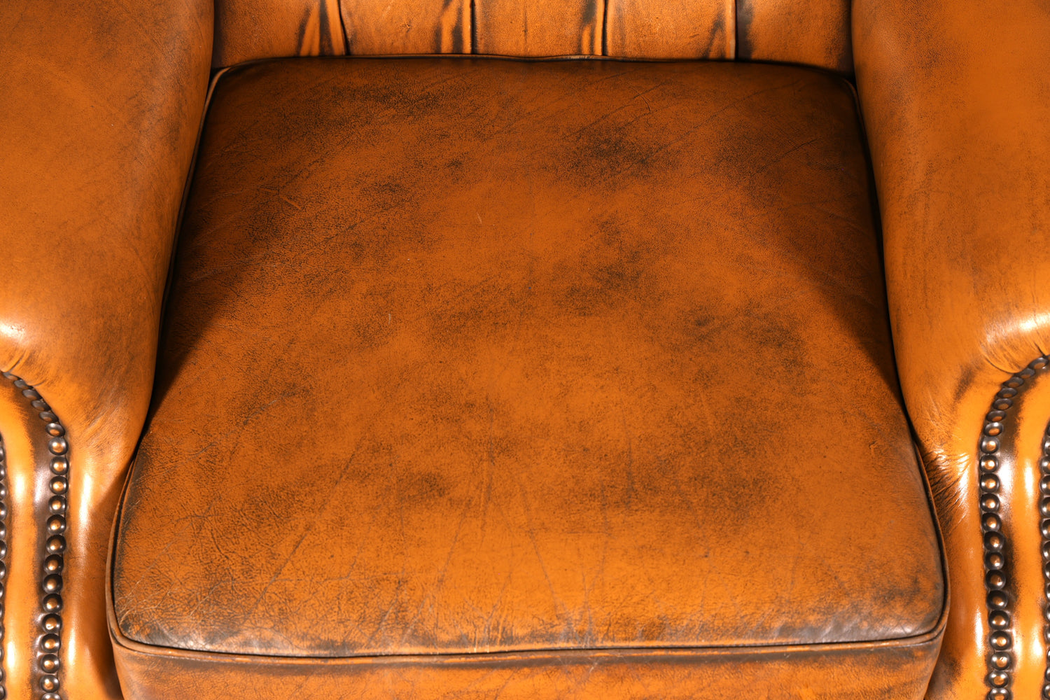 Beautiful original Chesterfield wingback armchair, English genuine leather gentleman’s chair, recliner with reclining function, vintage