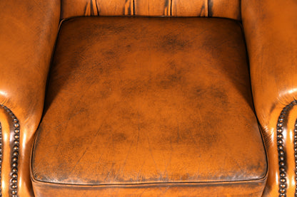 Beautiful original Chesterfield wingback armchair, English genuine leather gentleman’s chair, recliner with reclining function, vintage