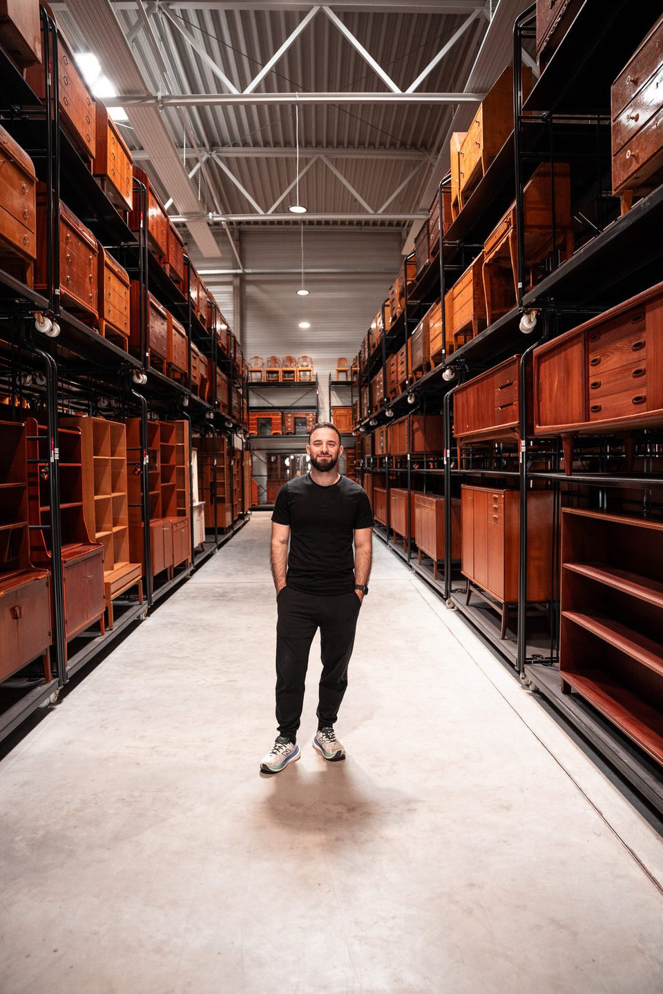 Volkan Yarar in the Hauptstadt Möblerei showroom