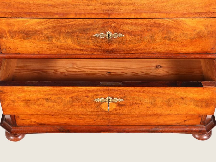 Drawer front with grain and key escutcheon